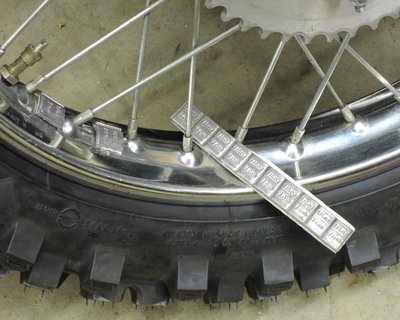 Stick-on wheel weights.