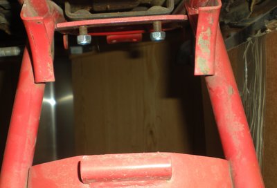 Spare frame showing the curved mounting tabs for the tool canister